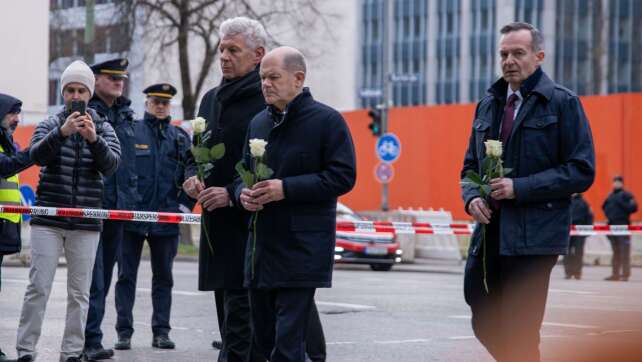 Scholz ruft in München zum Zusammenhalt auf