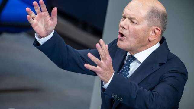 Scholz kündigt Industriegipfel an - Wahlkampfduell mit Merz